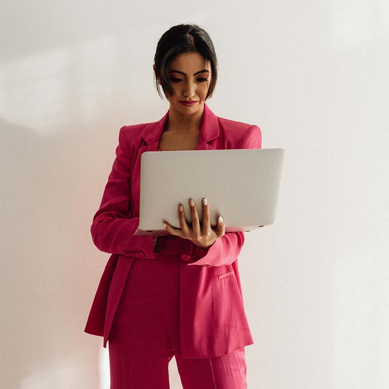 kaboompics elegant asian businesswoman in satin suit focused on laptop work elegant asian businesswoman in satin suit focused on laptop work 32070