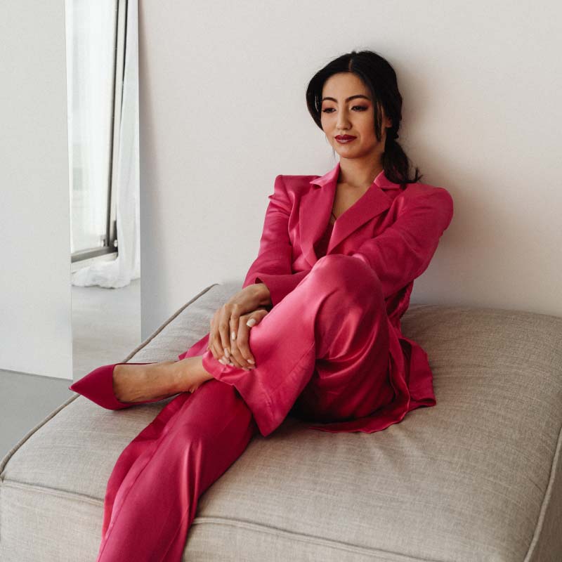 kaboompics elegant asian businesswoman in satin suit focused on laptop work elegant asian businesswoman in satin suit focused on laptop work 32078